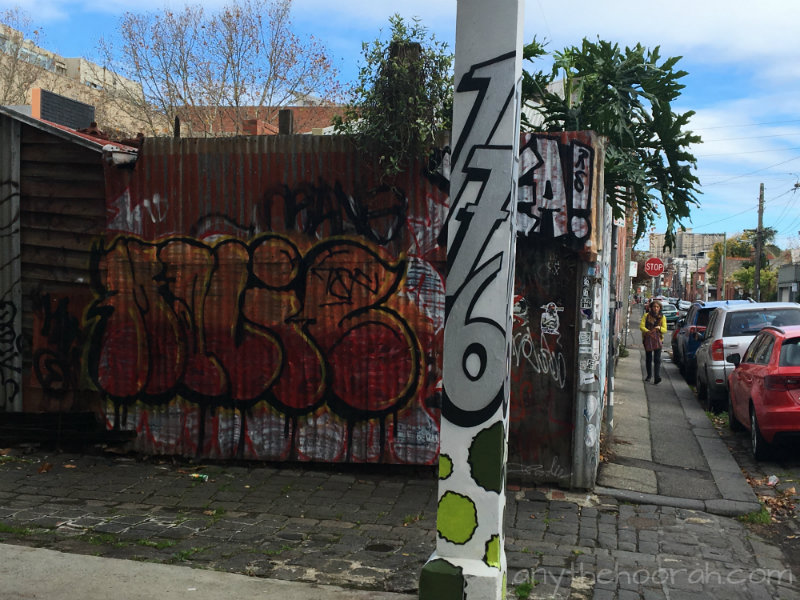 graffiti street number and street art in fitzroy - friendship is everything