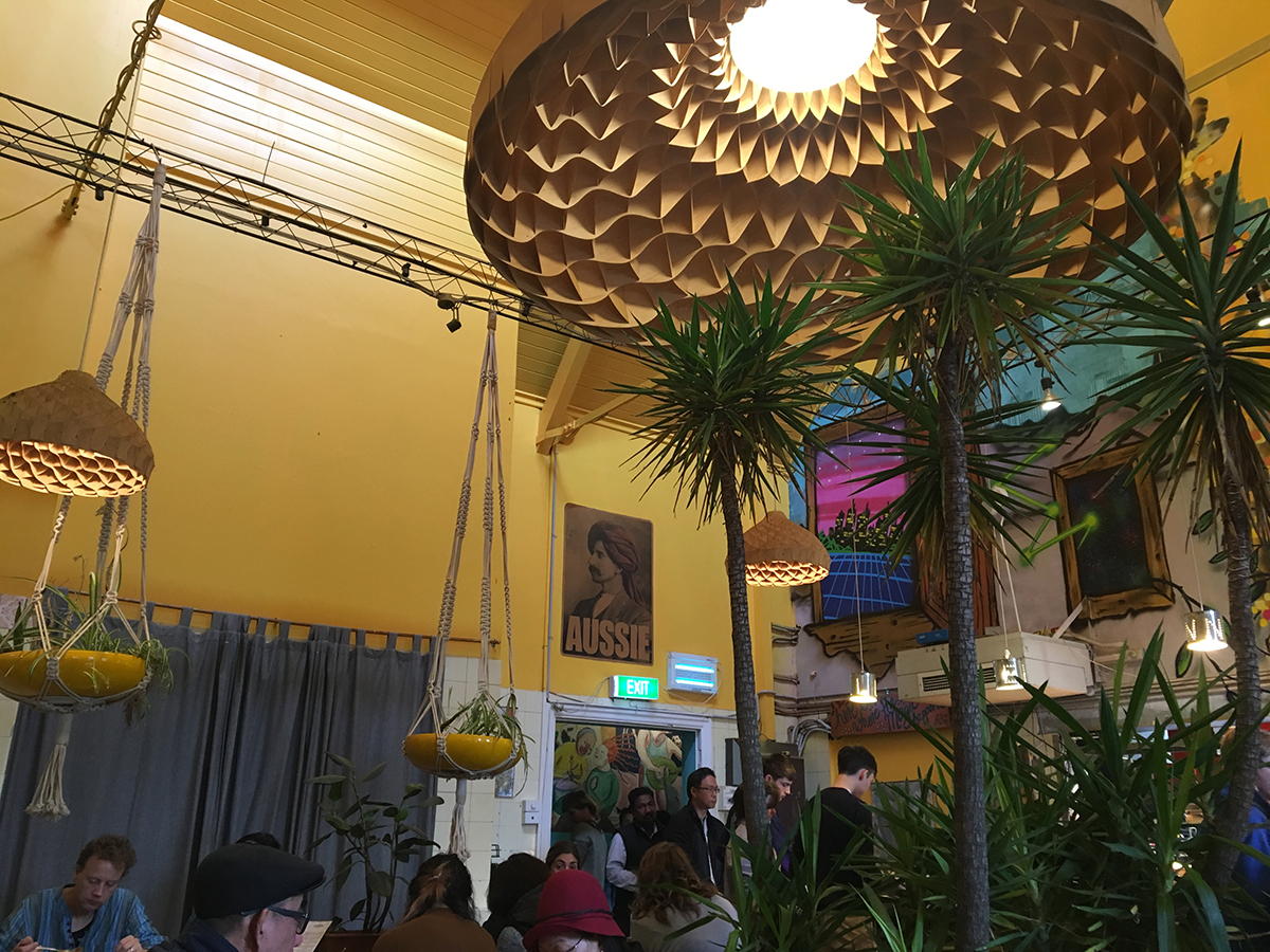 woven ceiling lights and plants and people inside interior of lentil as anything abbotsford