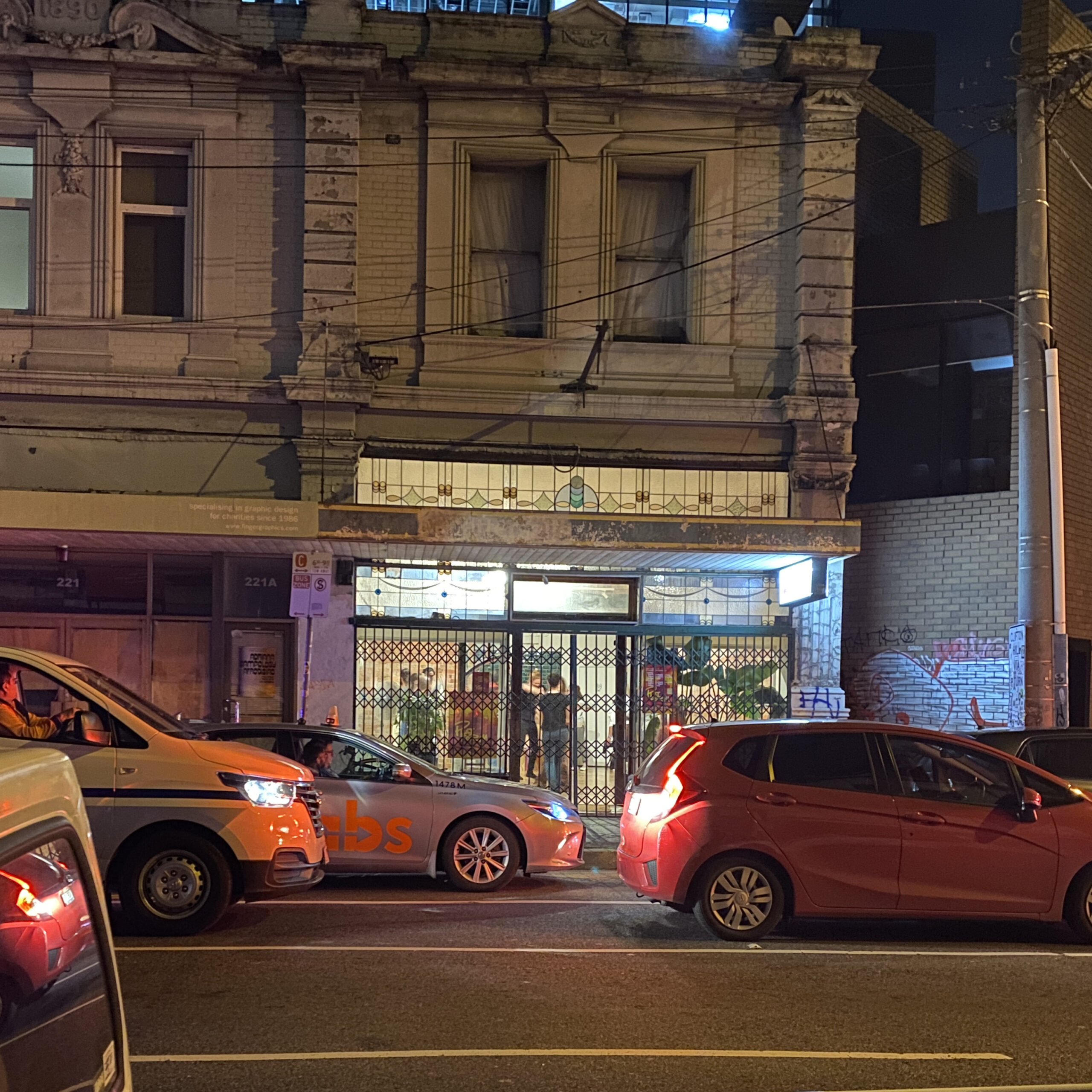 shopfront with dancers inside