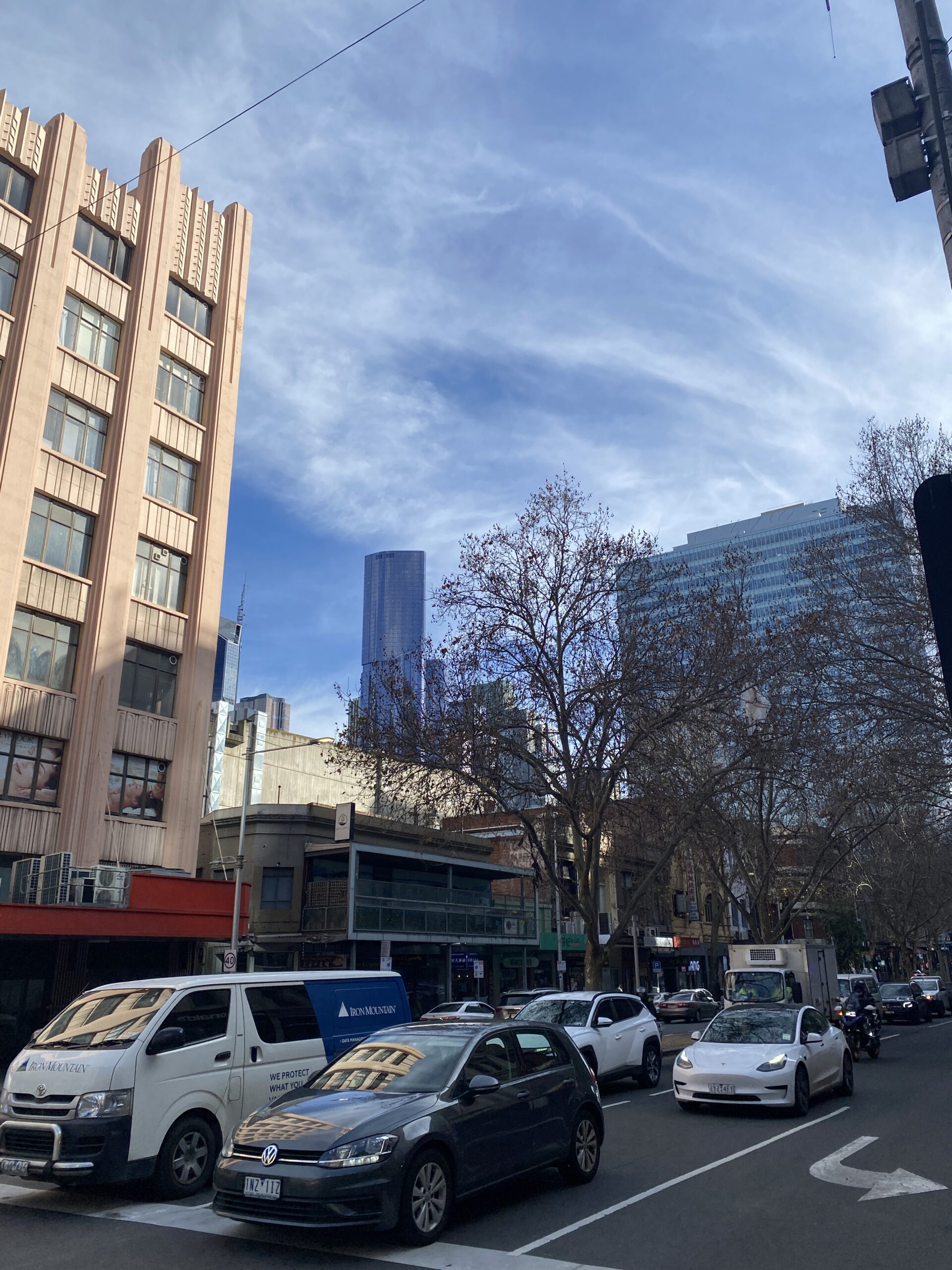 view to the city from a bourke street tram stop